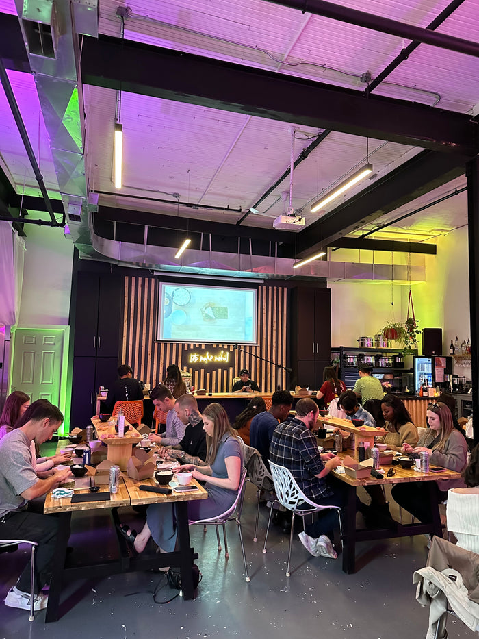 Group sushi-making class at Roll This Way